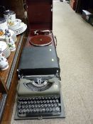 Red encased Sackville winding gramophone (winder missing) and a cased Good Companion Imperial