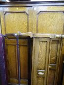 Vintage oak two door wardrobe and non-matching pair of oak bedends and irons