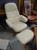 A modern swivel leather armchair & foot-stool Condition reports are provided on request by email
