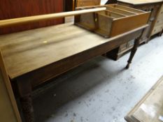 A narrow hall side-table with carved legs & an open bookcase Condition reports are provided on