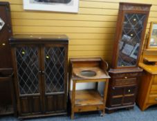 A carved & glazed corner cupboard, an antique wash basin stand & a glazed and linenfold bookcase