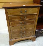 An antique inlaid mahogany six-drawer music cabinet Condition reports are provided on request by
