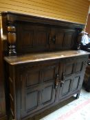 A good panelled Jacobean-style court cupboard Condition reports are provided on request by email