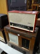 A Ekco red radio & an earlier vintage radio Condition reports are provided on request by email