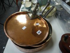 A pair of antique copper pans, one with lid & impressed marks Condition reports are provided on