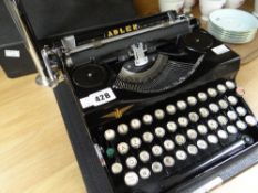 A good Adler cased vintage typewriter Condition reports are provided on request by email only for