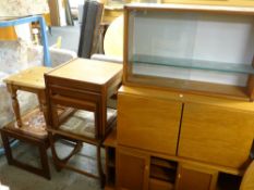 A nest of three mid-century teak coffee tables, two similar period tile-top coffee tables together
