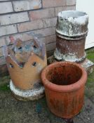 Three terracotta chimney pots