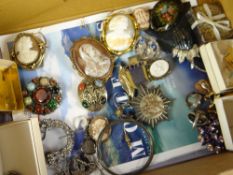 A box of mixed jewellery including brooches, marcasite items, Scottish-type brooch, silver backed