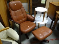 A tan leather swivel armchair, foot stool, two circular tables & a mirror Condition reports are