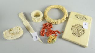Parcel of ivory items including carved card case, bangle ETC Condition reports are provided on
