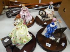 A set of four Royal Doulton figures from 'The Gentle Arts' series, each with certificate & on wooden