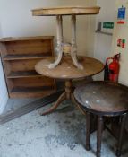 A parcel of three wooden tables together with a small bookshelf