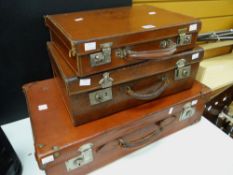 Three good tan leather vintage suitcases / overnight cases / briefcases Condition reports are
