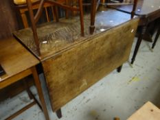 An antique drop leaf dining table Condition reports are provided on request by email only for this