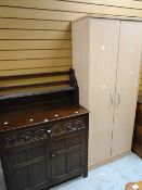 A carved buffet sideboard with plate rack top & a modern two-door office cupboard Condition