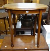 An oval mahogany occasional table Condition reports are provided on request by email only for this