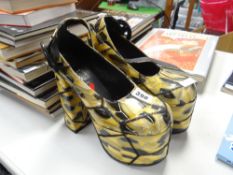 A pair of Spanish made faux-crocodile leather platform shoes Condition reports are provided on