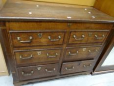 A nineteenth century crossbanded oak & mule chest of six drawers with brass fittings, 109cms wide