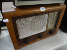 A GEC vintage veneered case radio Condition reports are provided on request by email only for this