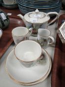 A Grimwades Beatrix Pottery nursery teaset comprising pair of cups & saucers, teacup & milk jug