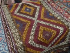 A Suzni Kelim runner rug, 267 x 74cms Condition reports are provided on request by email only for