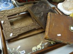 An early twentieth century lockable book ledger, an Indian decorative tray & two carved wood items