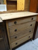 A vintage rail-back chest of four long drawers Condition reports are provided on request by email