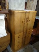 A vintage lightwood tall-boy, 72cms wide Condition reports are provided on request by email only for