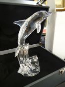 A boxed Swarovski Silver Crystal dolphin ornament
