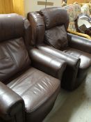 A pair of modern chocolate brown leather armchairs Condition reports are provided on request by