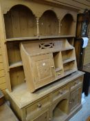 A pine dresser, 142cms wide & a pine hanging rack Condition reports are provided on request by email