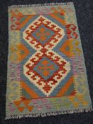 A vegetable dye wool Choli Kelim runner, 89 x 60cms Condition reports are provided on request by