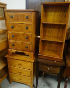 A parcel of furniture including small reproduction four-drawer chest, open bookcase ETC Condition