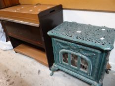 A painted metal French-style log burner Condition reports are provided on request by email only
