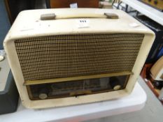 An Ekco cream encased (possibly Bakelite) radio Condition reports are provided on request by email