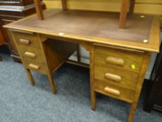 A good vintage desk with leather surface & bank of six drawers Condition reports are provided on