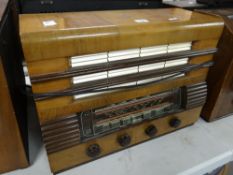 A Regentone vintage veneer cased radio Condition reports are provided on request by email only for