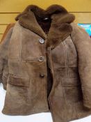A twentieth century suede & fur overcoat Condition reports are provided on request by email only for