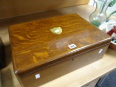 A vintage oak twin-handled cutlery canteen box Condition reports are provided on request by email