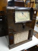 A Cossor Art Deco period veneer encased radio Condition reports are provided on request by email