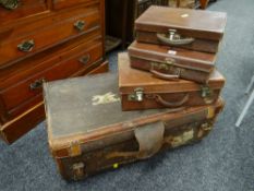 A large vintage canvas suitcase & three smaller vintage cases Condition reports are provided on
