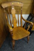 A good antique farmhouse Windsor elbow chair on turned supports Condition reports are provided on