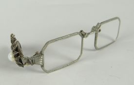 A pair of decorative folding loignettes Condition reports are provided on request by email only