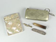 A mother-of-pearl tiled floral decorated card case, an EPNS clutch purse, vintage fruit knife,