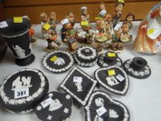 A parcel of Wedgwood black Jasperware table items & a quantity of Hummel figures Condition reports