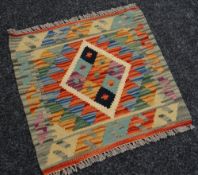 A vegetable dye wool Choli Kelim runner, 47 x 51cms Condition reports are provided on request by