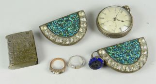 A vintage silver encased pocket watch, a pair of mosaic belt buckles, three various rings ETC