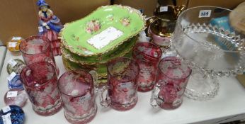 A set of six ruby flush cut tankards, five decorative glass paperweights, a Royal Doulton