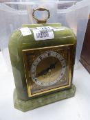 An onyx table clock & a suitcase of collectables Condition reports are provided on request by